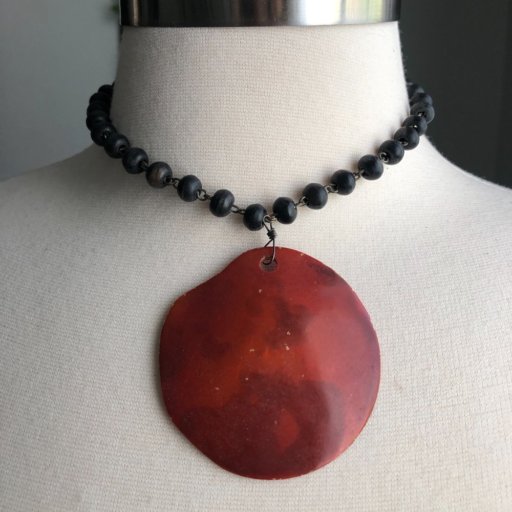 Large Red Circle Pendant on Black Beaded Necklace